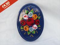Oval Pottery Wall Plaque, blue background,  hand-painted with traditional canal rose design.